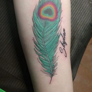 Peacock feather tattoo
