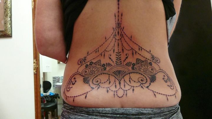 Back chandelier tattoo