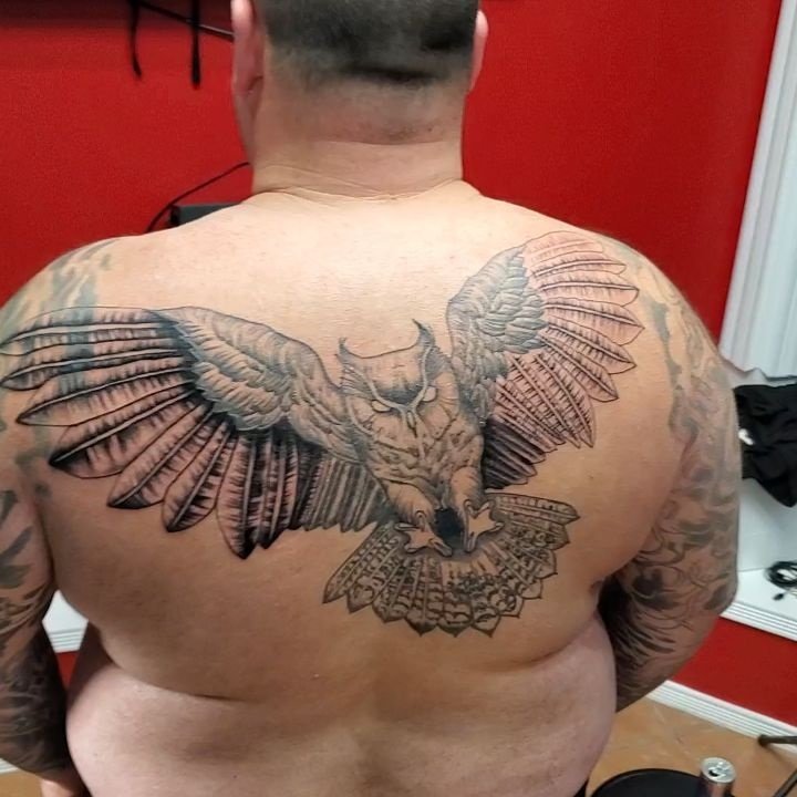 Owl back tattoo