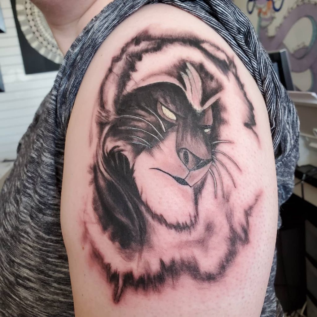 Lion king tattoo face